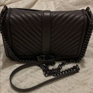 Authentic Rebecca mink off crossbody bag.